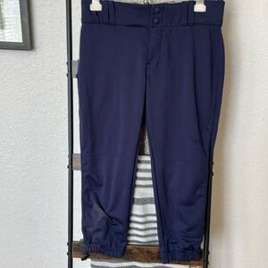 One pair of champaro softball pants, one pair of mizuno sliding shorts.